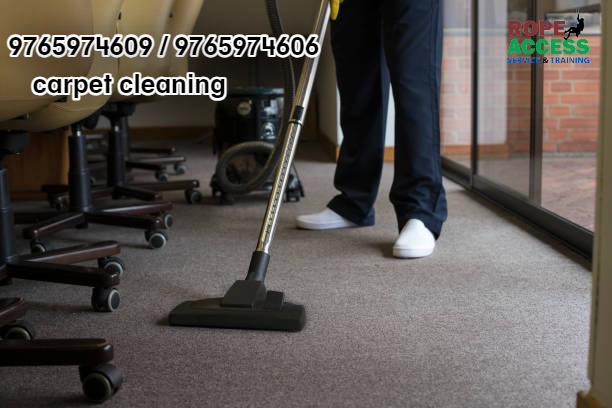 A staff from carpet cleaning service in kathmandu cleaning office carpet