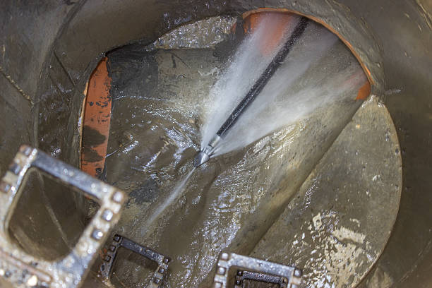 Cleaning underground water tank with pressure gun