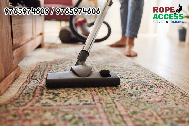vacuuming home's carpet from carpet cleaning service in Kathmandu